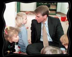 Could not find the concerned-Racicot-looks-at-map-of-Libby photo-op, but this one serves the same purpose.